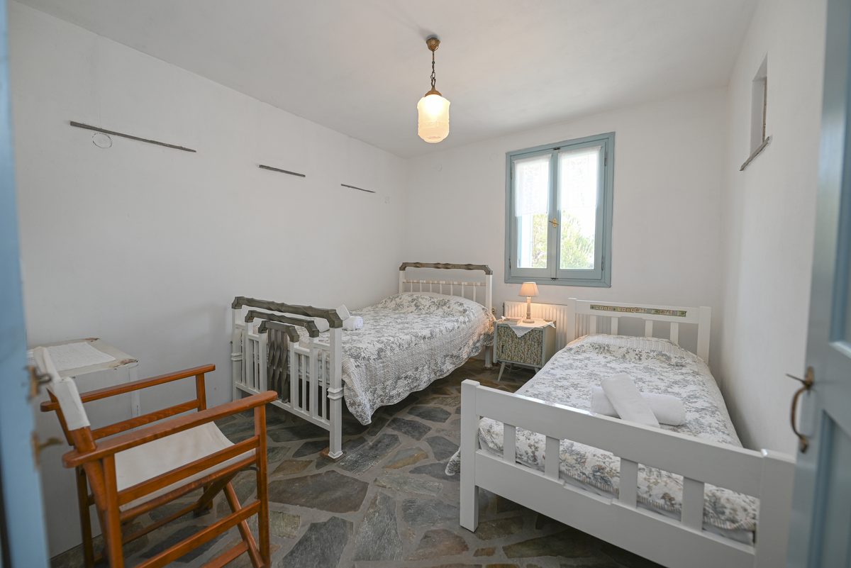 Twin bedroom at Astraea Seaview House, Tinos